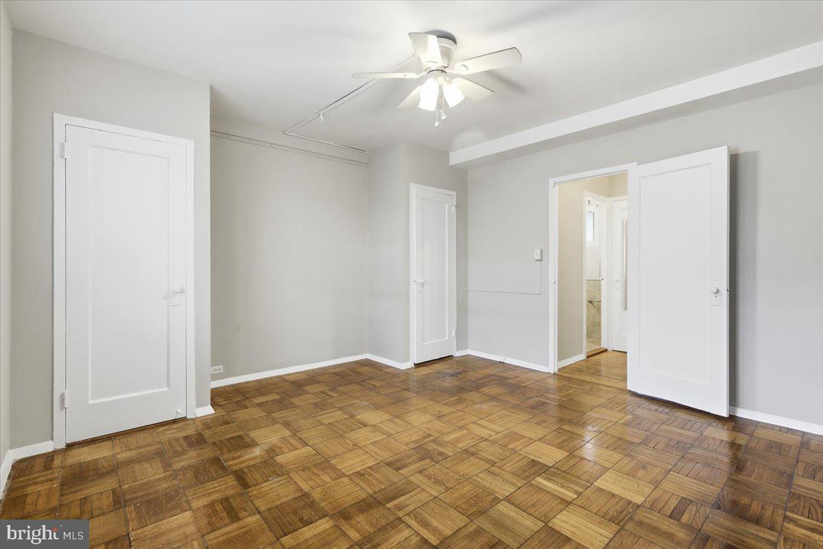 1737 Preston Road, Unit B Alexandria, VA 22302 - Photo 11 of 17 a view of a big room with wooden floor and a chandelier fan