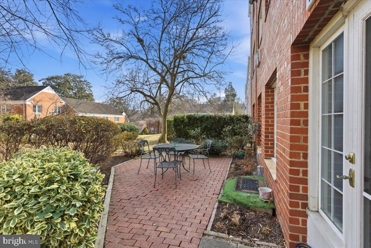 1737 Preston Road, Unit B Alexandria, VA 22302 - Photo 15 of 17 a view of a patio with table and chairs and potted plants