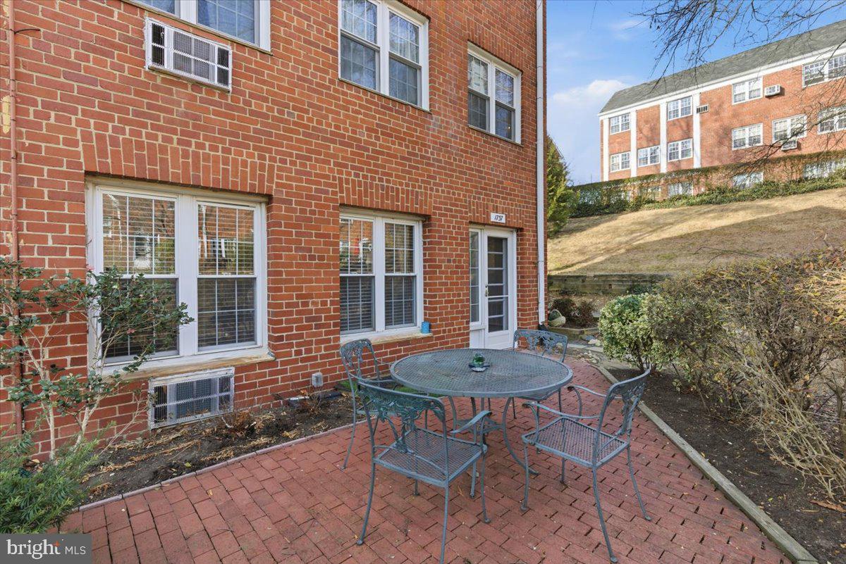 1737 Preston Road, Unit B Alexandria, VA 22302 - Photo 16 of 17 a view of a house with backyard sitting area and garden