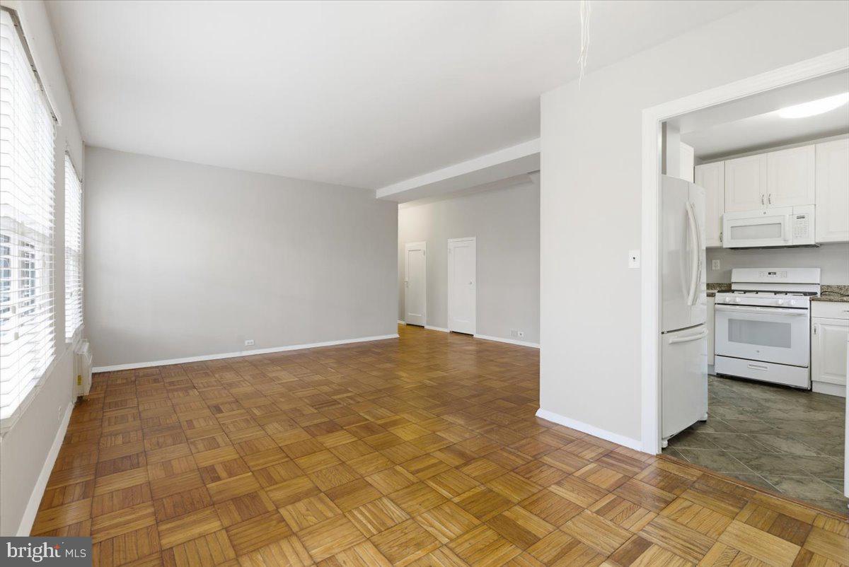 1737 Preston Road, Unit B Alexandria, VA 22302 - Photo 3 of 17 a view of a kitchen with a sink cabinets and a window