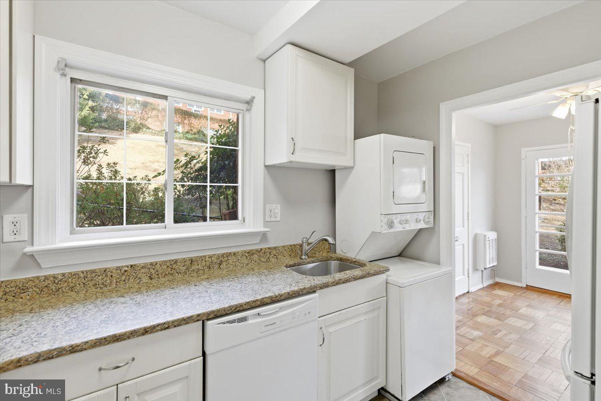 1737 Preston Road, Unit B Alexandria, VA 22302 - Photo 8 of 17 a kitchen with granite countertop sink and cabinets