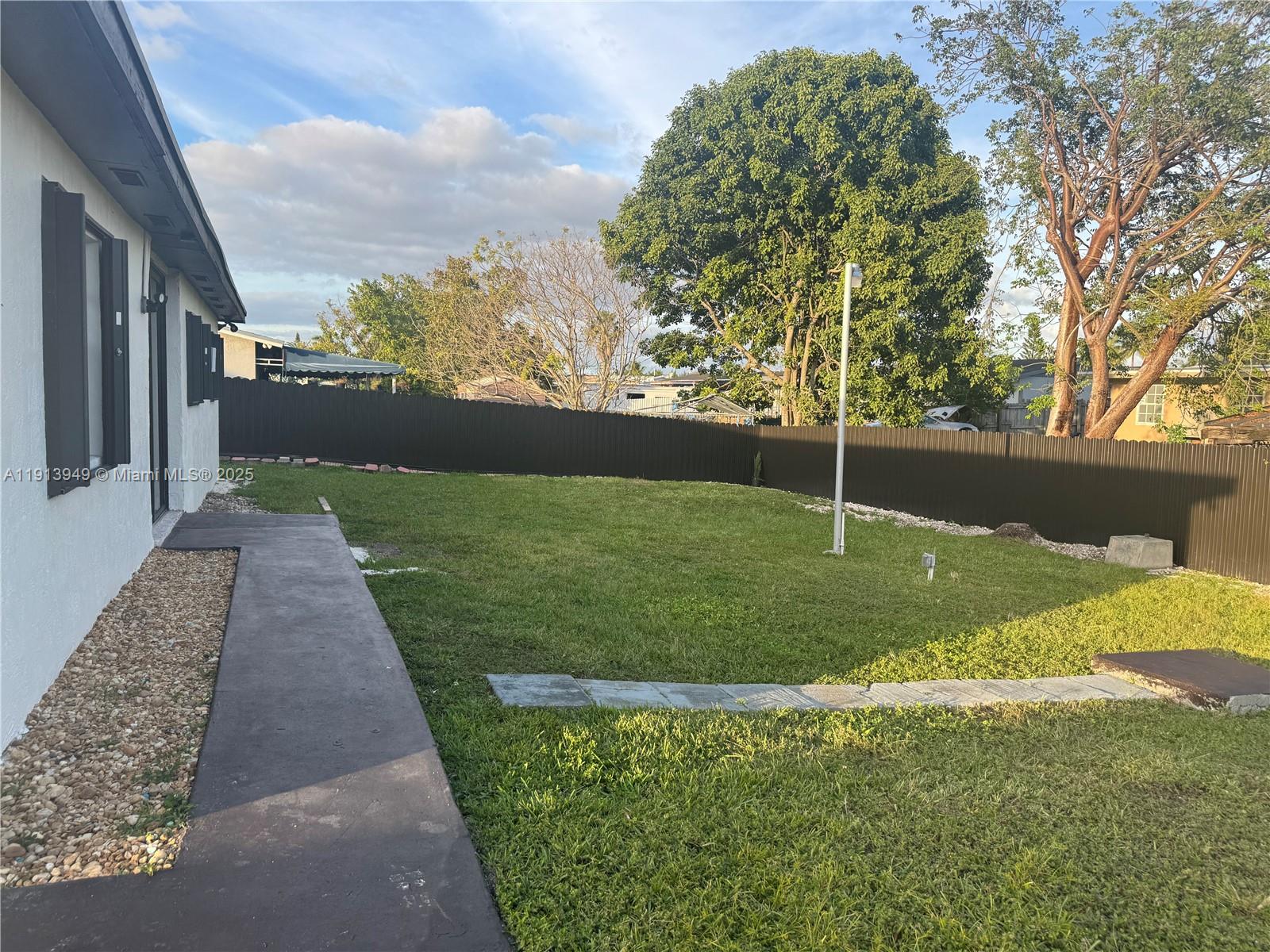 29523 Southwest 144th Court Homestead, FL 33033 - Photo 11 of 59 a view of a backyard