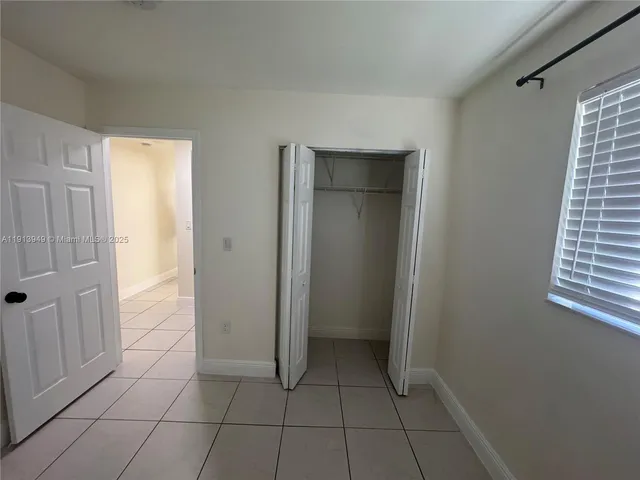 a view of a kitchen with a sink