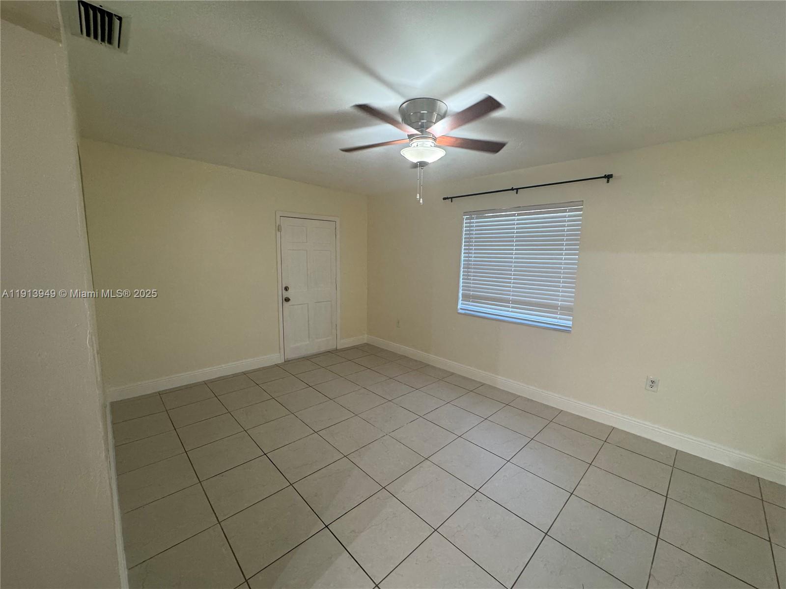 29523 Southwest 144th Court Homestead, FL 33033 - Photo 22 of 59 a view of an empty room