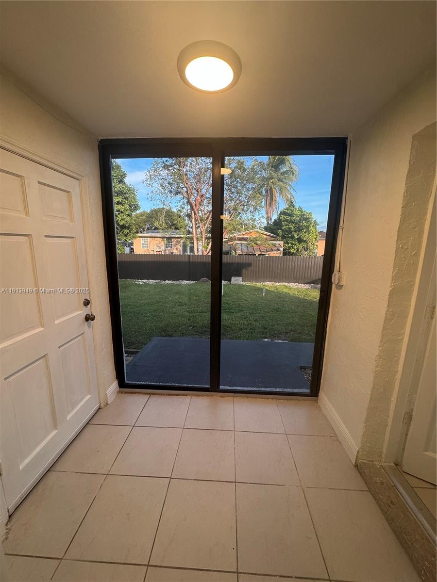 29523 Southwest 144th Court Homestead, FL 33033 - Photo 28 of 59 a view of a room with a large window