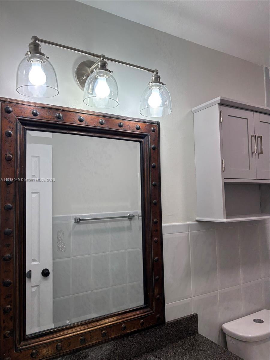 29523 Southwest 144th Court Homestead, FL 33033 - Photo 39 of 59 a view of a room with wooden floor