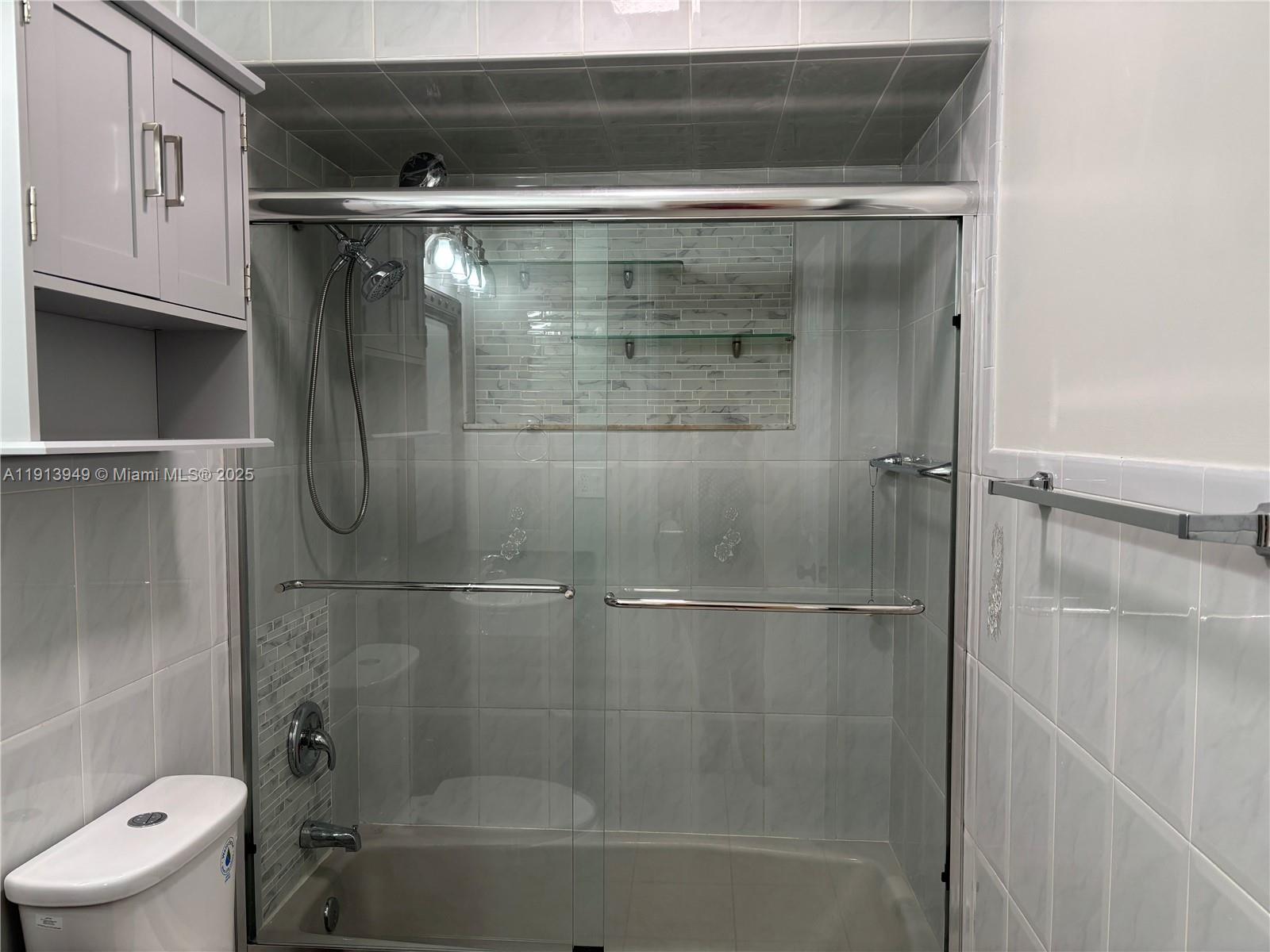 29523 Southwest 144th Court Homestead, FL 33033 - Photo 41 of 59 a bathroom with a shower