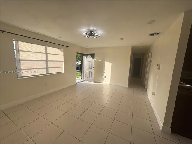 a view of a hallway with closet