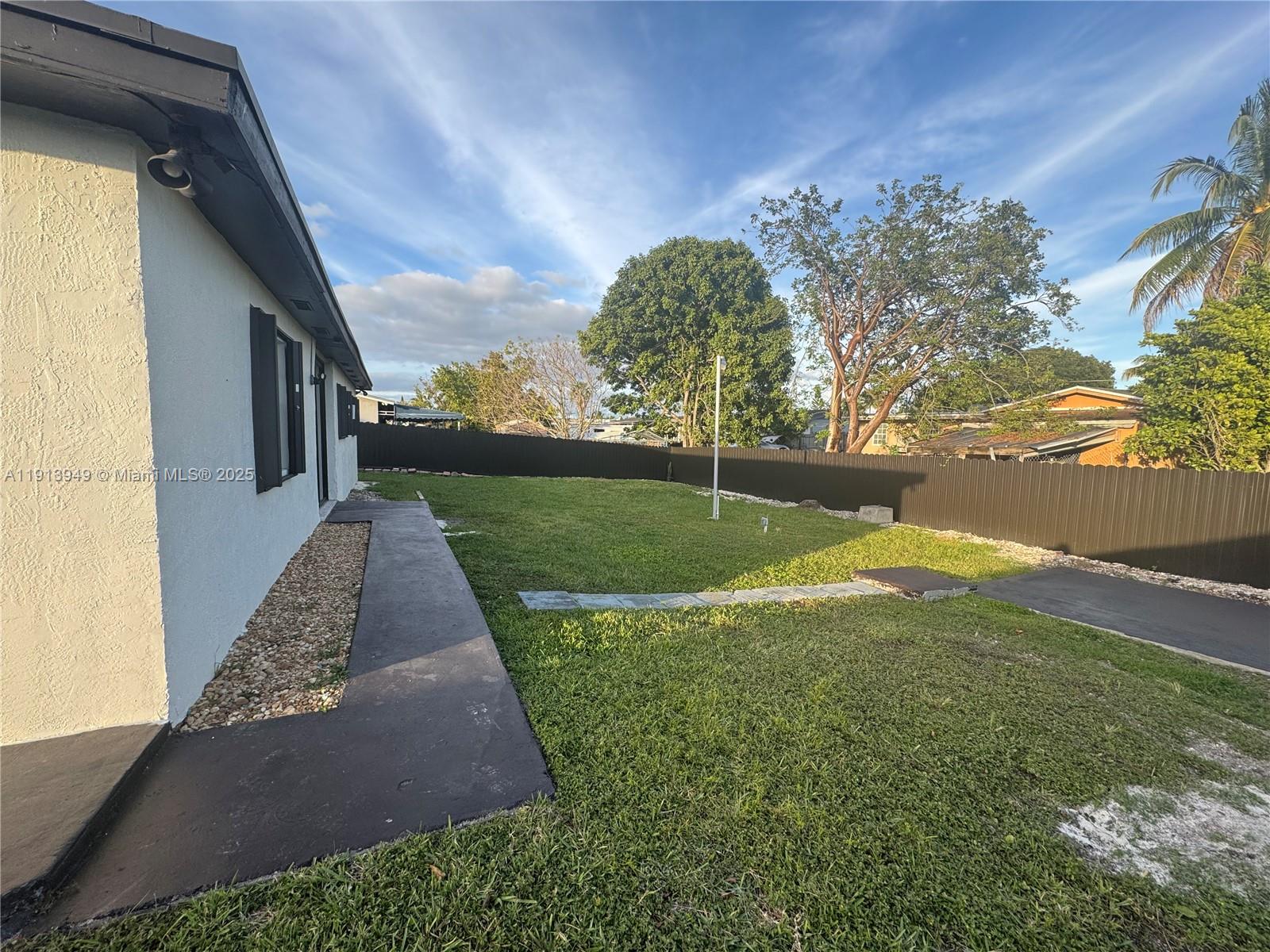 29523 Southwest 144th Court Homestead, FL 33033 - Photo 57 of 59 a view of a backyard