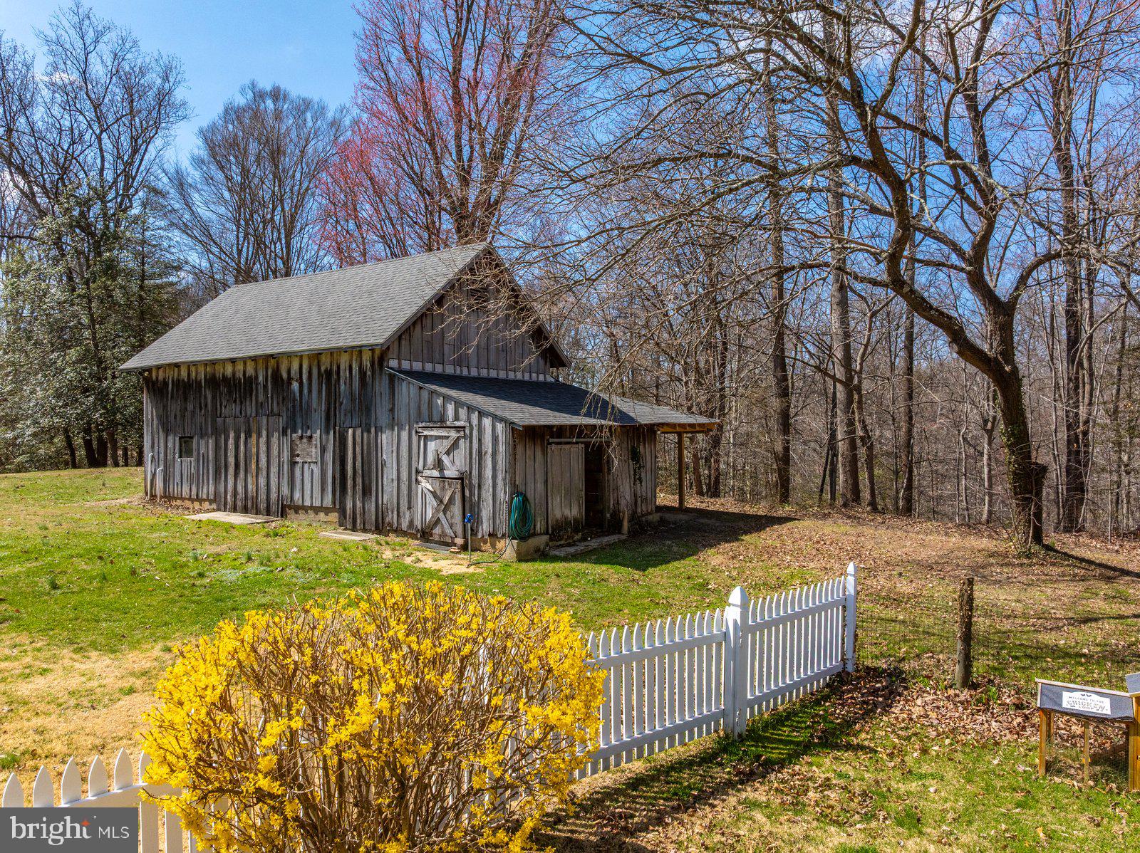 1118 Gum Bottom Road Crownsville, MD 21032 - Photo 6 of 52 Charming rustic barn in serene landscape.