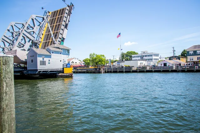 a buildings covered with tall trees