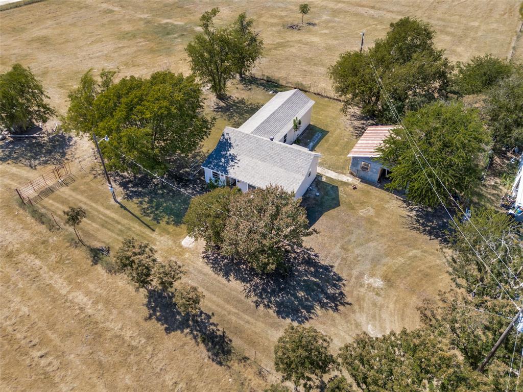 7165 County Road 1232 Godley, TX 76044 - Photo 12 of 17 an aerial view of a house with a yard