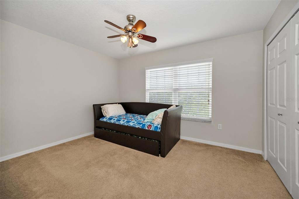 5628 Sea Turtle Court New Port Richey, FL 34652 - Photo 26 of 99 a living room with furniture and a window