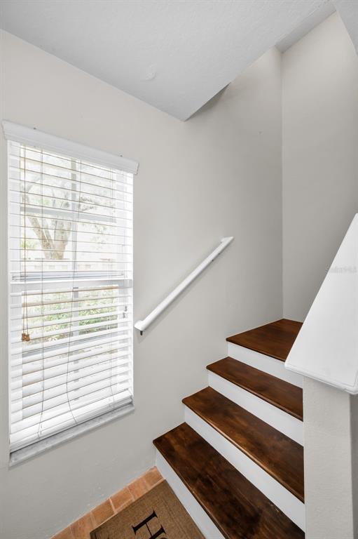 5628 Sea Turtle Court New Port Richey, FL 34652 - Photo 32 of 99 a view of wooden floor and windows in a room