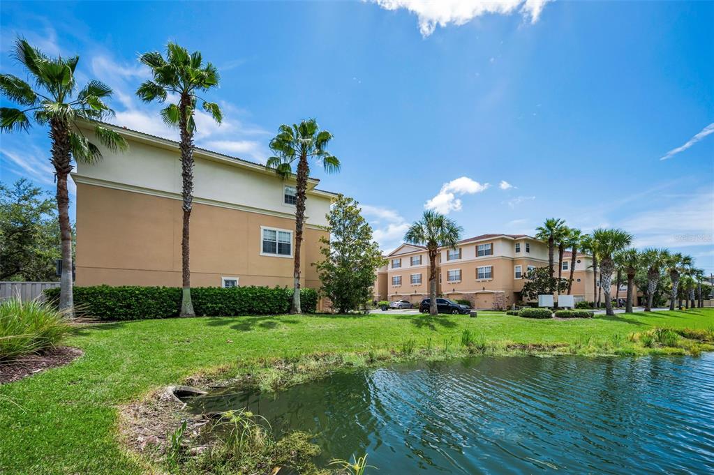 5628 Sea Turtle Court New Port Richey, FL 34652 - Photo 43 of 99 a front view of a house with garden