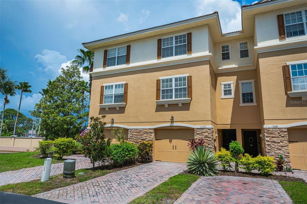 5628 Sea Turtle Court New Port Richey, FL 34652 - Photo 47 of 99 a front view of a house with a yard