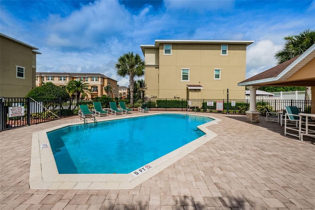 5628 Sea Turtle Court New Port Richey, FL 34652 - Photo 55 of 99 a view of swimming pool with outdoor seating