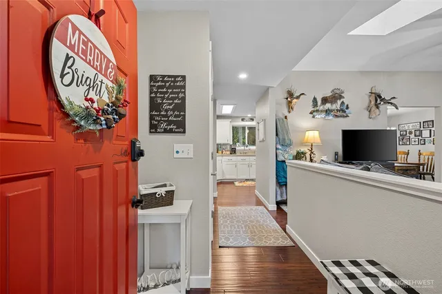 a view of kitchen with furniture and flat screen tv