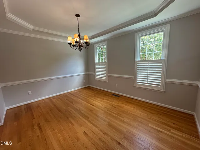 a bathroom with a sink toilet and mirror