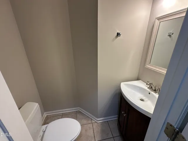 a view of an entryway with wooden floor and stairs