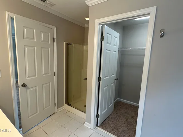 a view of a room with racks on the wall