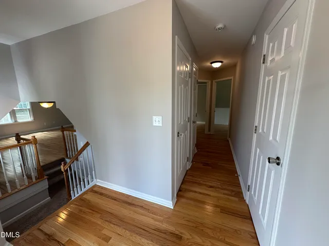 a view of entryway with wooden floor