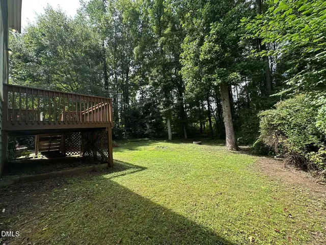 a view of a yard with patio