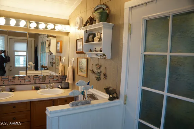 a bed room with a bed and a television