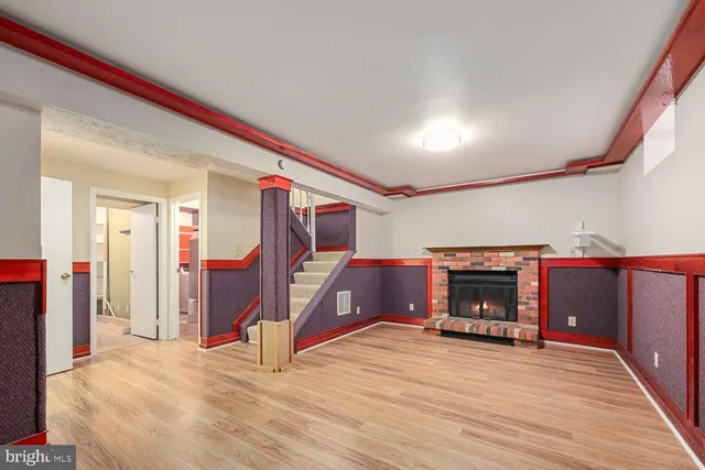 a view of livingroom with furniture and fireplace