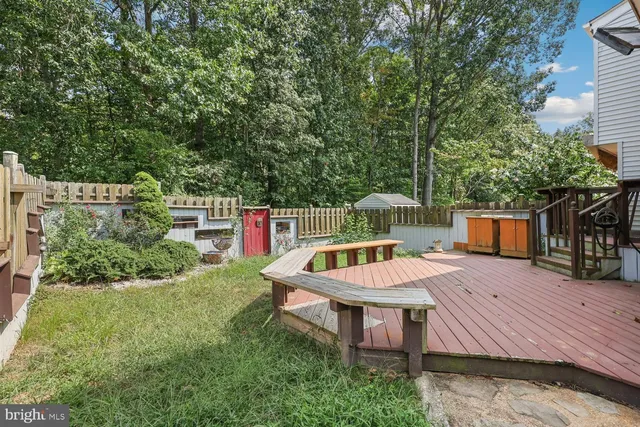 a view of a porch with potted plants