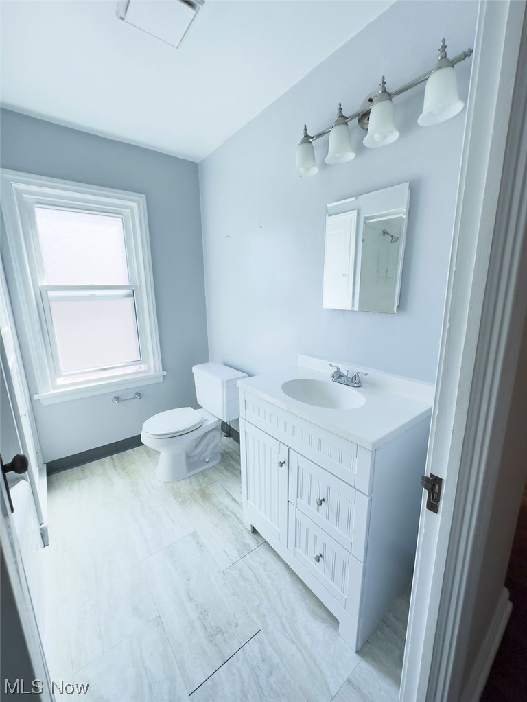 3985 Rosemond Road Cleveland Heights, OH 44121 - Photo 19 of 25 Bathroom with light tile flooring, large vanity, and mirror