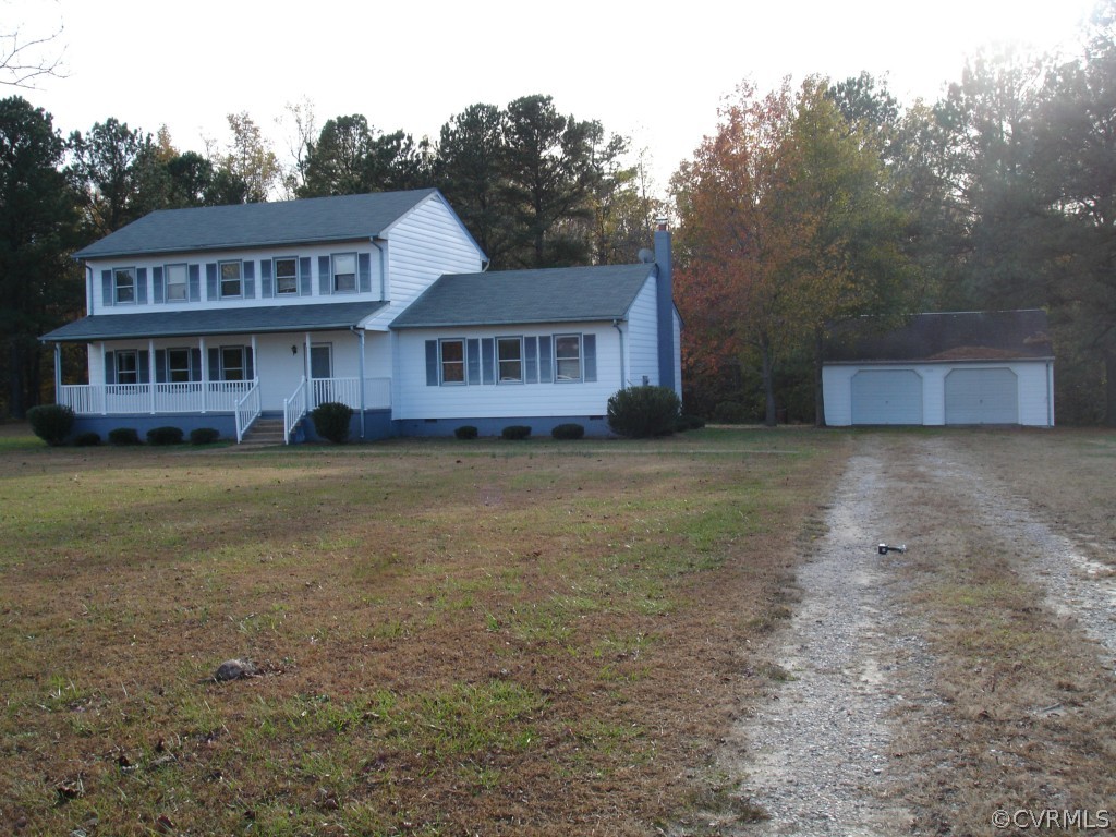 13267 Moody Road Hopewell, VA 23860 - Photo 1 of 24 View of the home from the road - framed by the woo