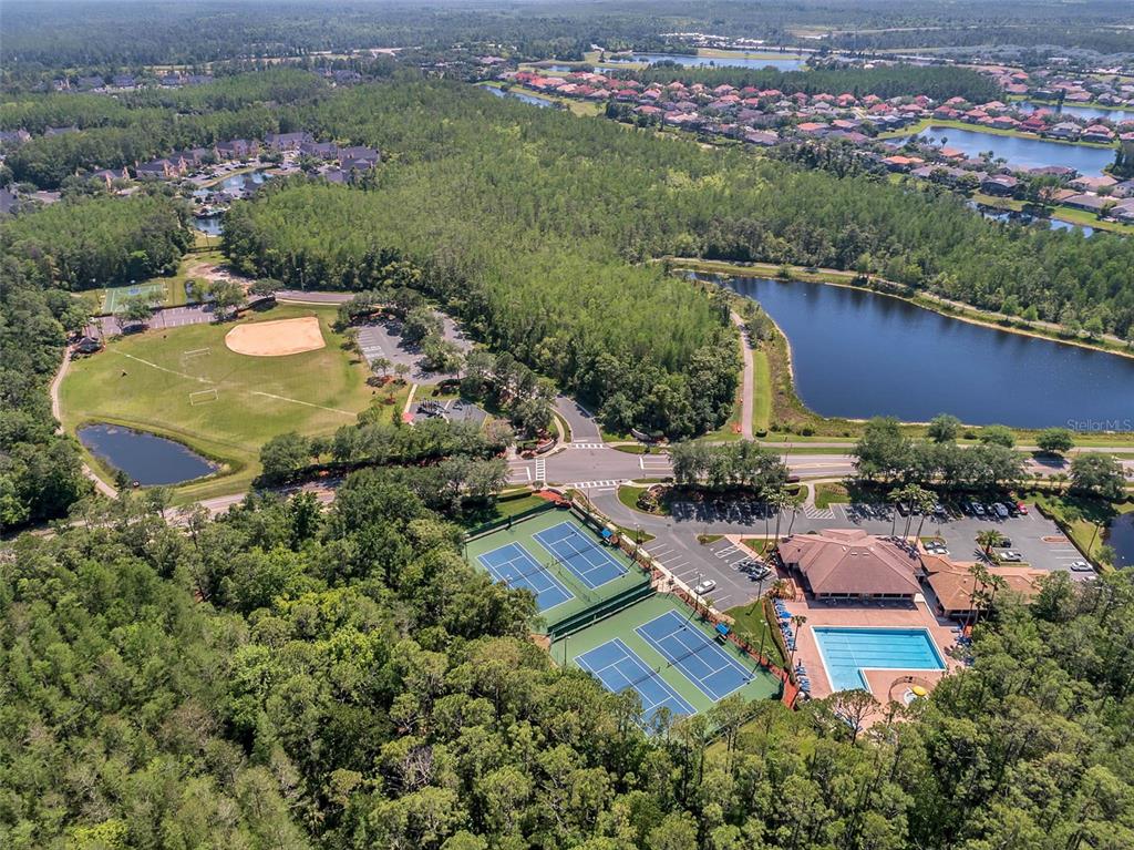 2541 Teton Stone Run Orlando, FL 32828 - Photo 70 of 82 an aerial view of a house with a garden