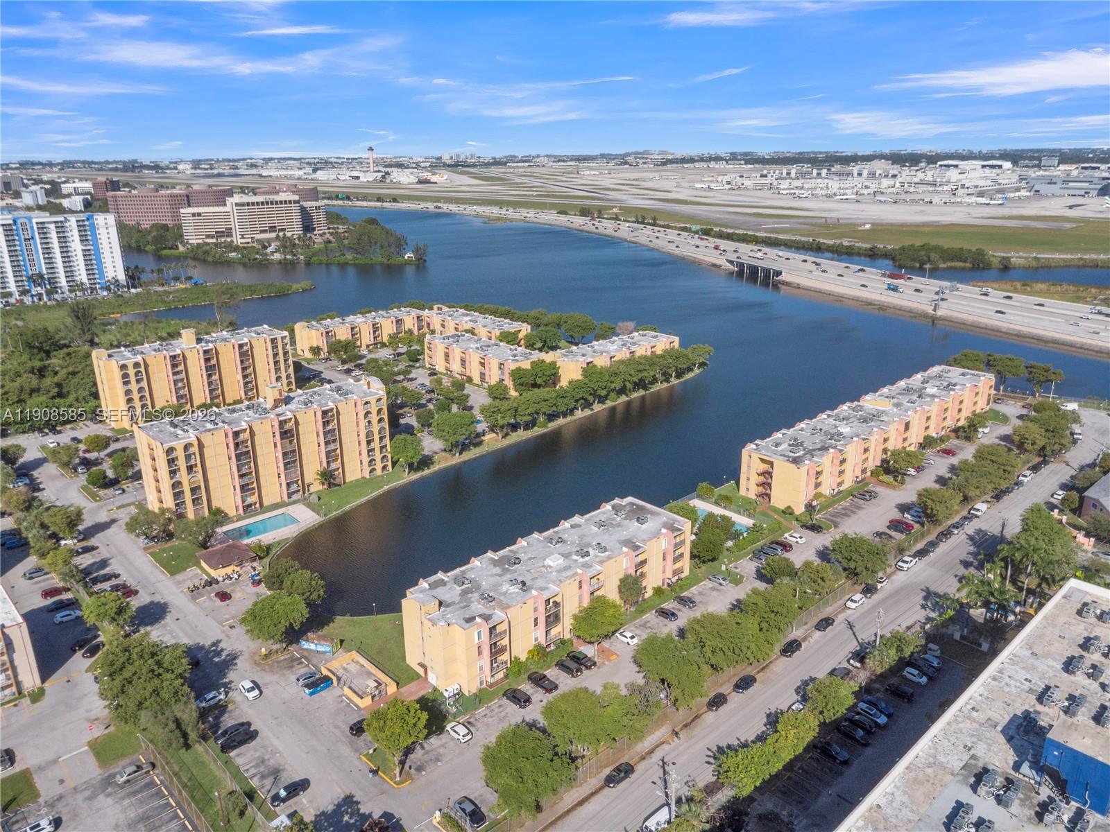 4709 Northwest 7th Street, Unit 2049 Miami, FL 33126 - Photo 14 of 51 a view of a city and an ocean view