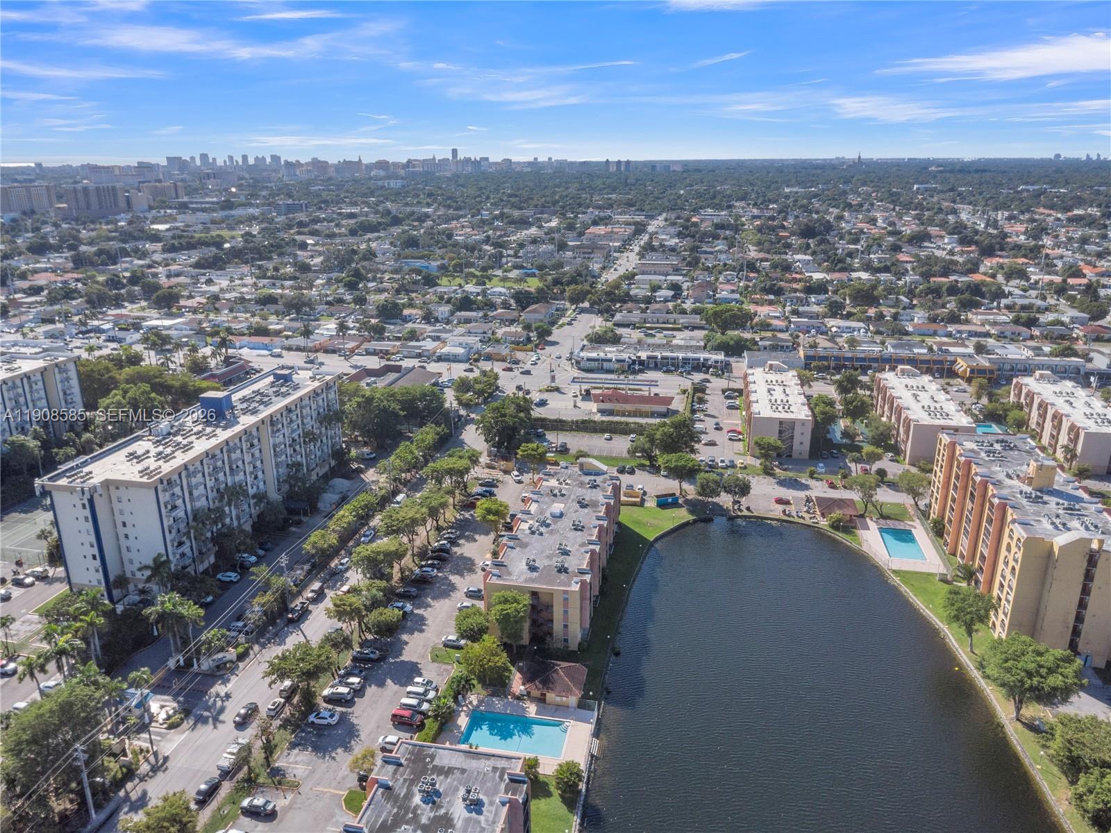 4709 Northwest 7th Street, Unit 2049 Miami, FL 33126 - Photo 18 of 51 an aerial view of multiple house