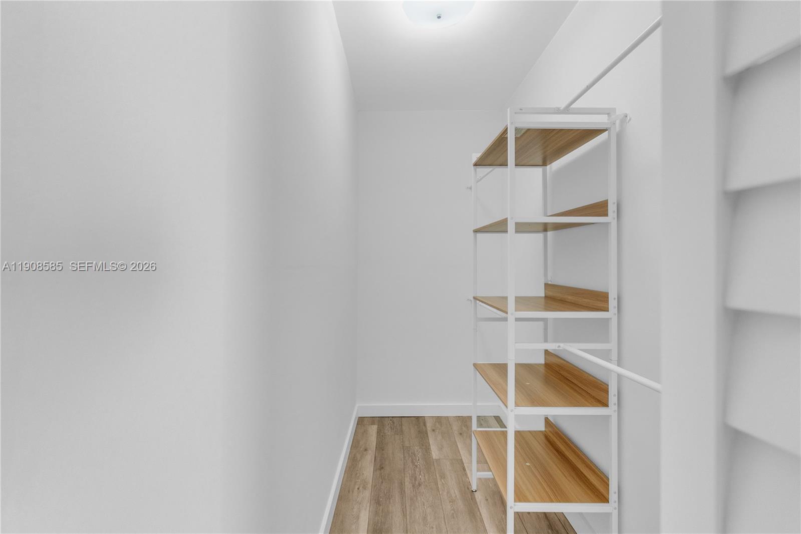 4709 Northwest 7th Street, Unit 2049 Miami, FL 33126 - Photo 27 of 51 a room with storage and utility