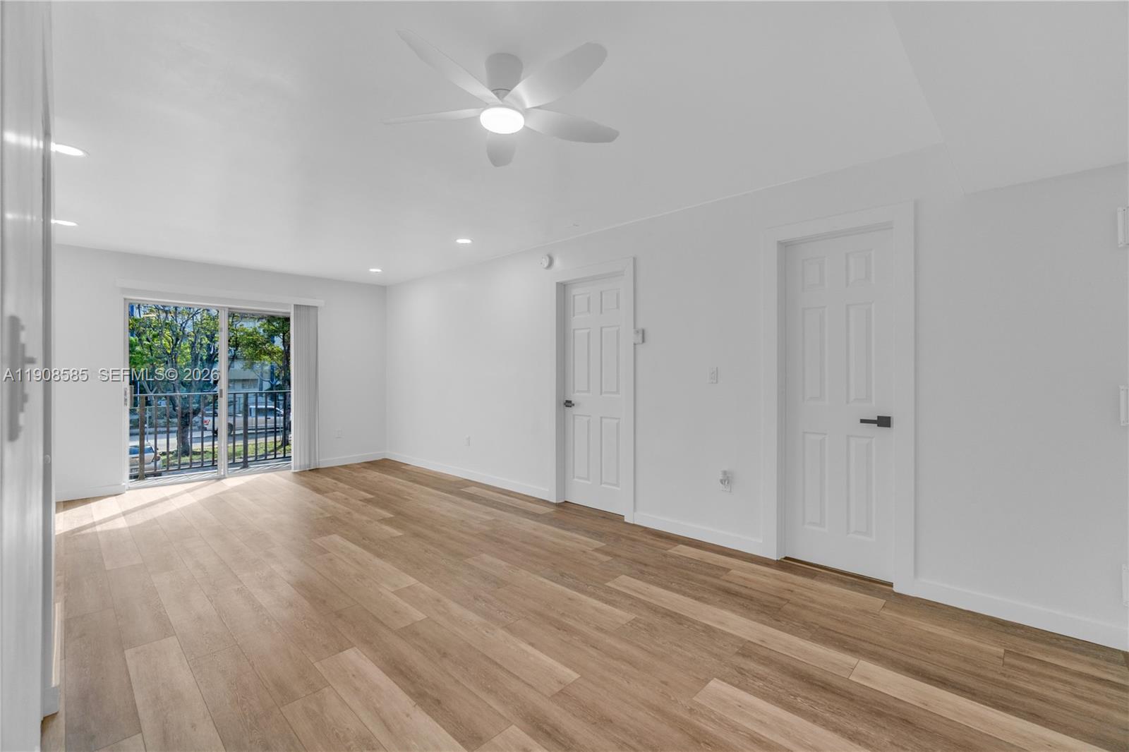 4709 Northwest 7th Street, Unit 2049 Miami, FL 33126 - Photo 31 of 51 a view of an empty room with a window