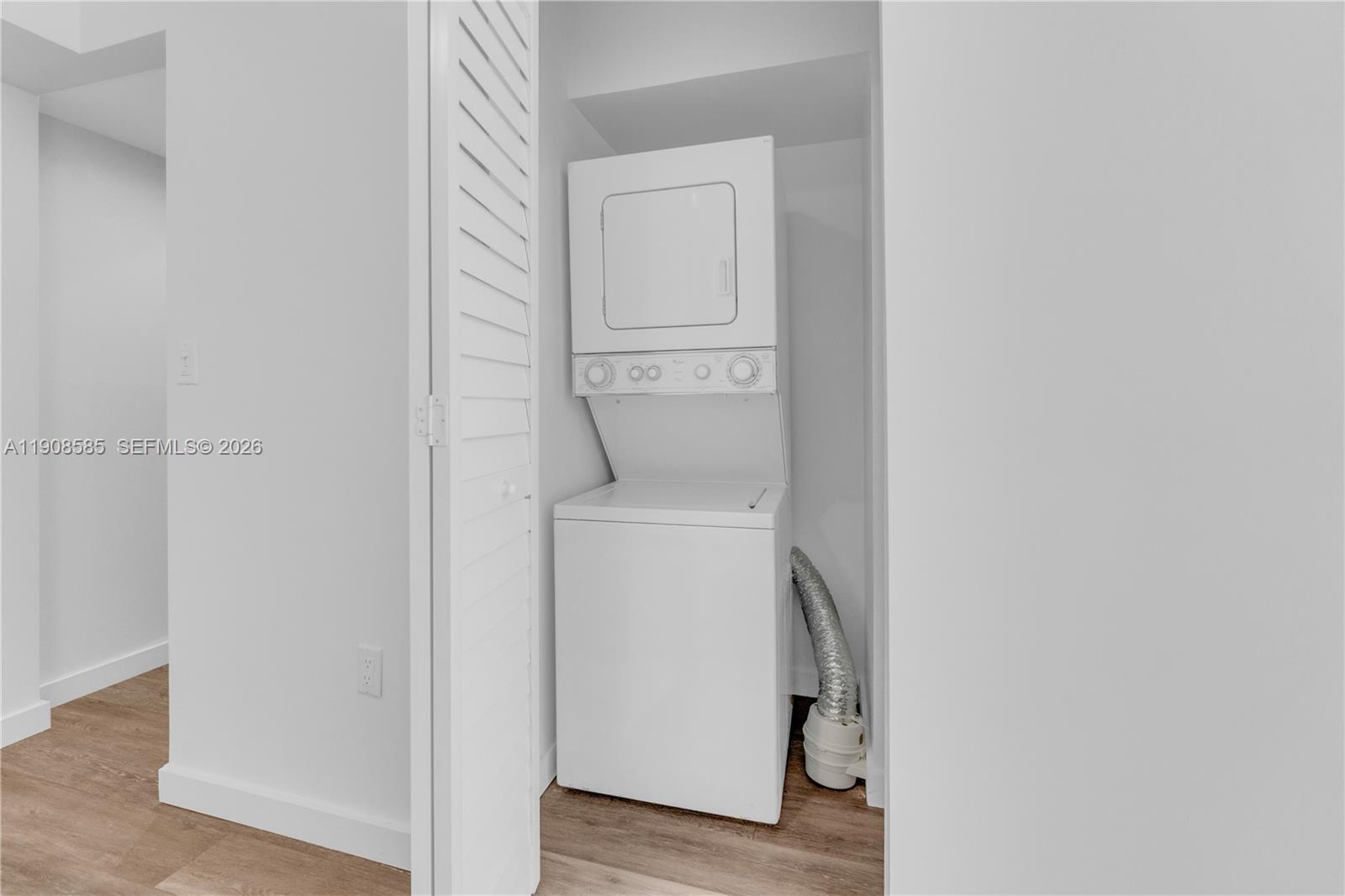 4709 Northwest 7th Street, Unit 2049 Miami, FL 33126 - Photo 10 of 51 a utility room with dryer and washer