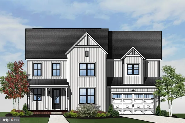 a view of house with a yard and potted plants