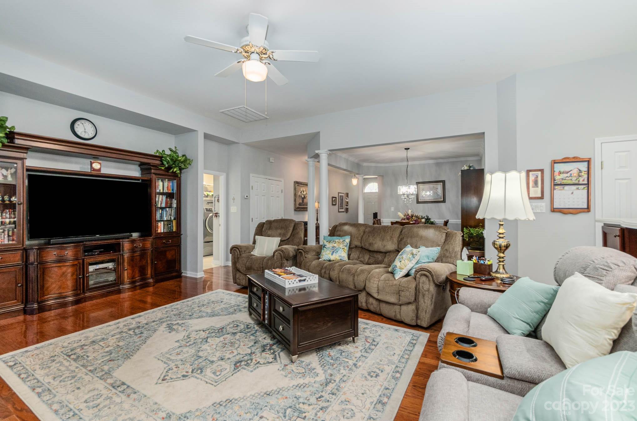 112 Pine Lake Drive Monroe, NC 28110 - Photo 20 of 37 a living room with furniture and a flat screen tv