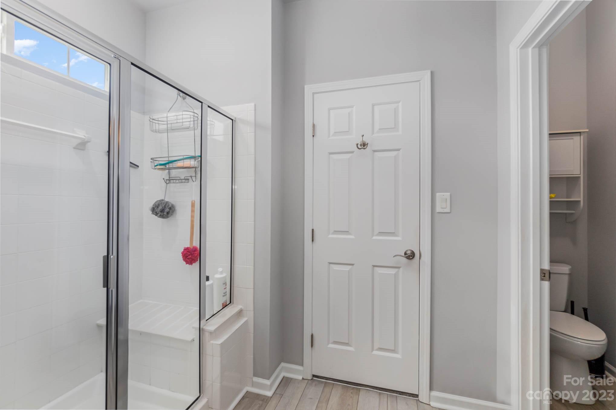 112 Pine Lake Drive Monroe, NC 28110 - Photo 24 of 37 a bathroom that has a shower toilet and a sink
