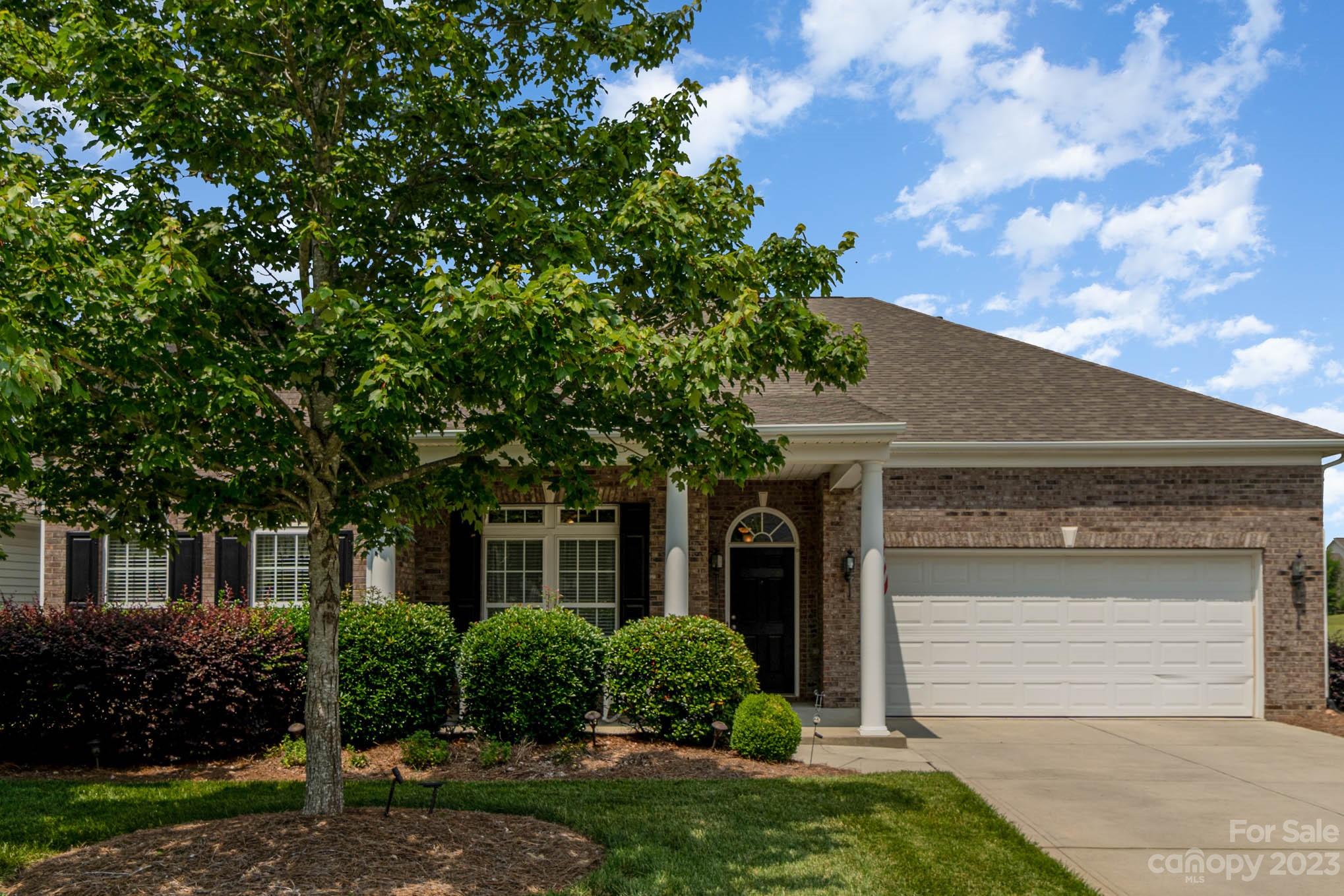 112 Pine Lake Drive Monroe, NC 28110 - Photo 3 of 37 front view of a house with a yard