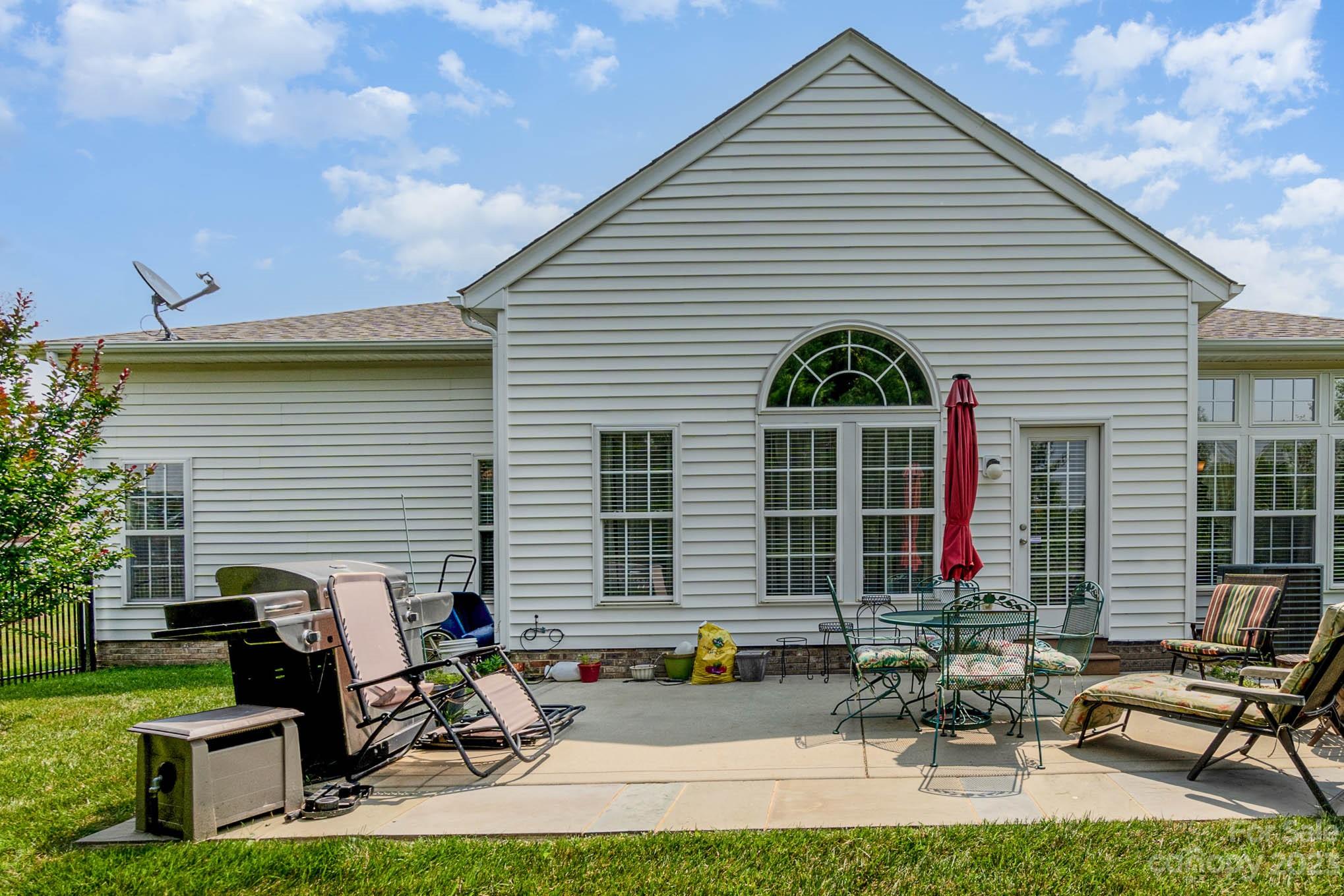 112 Pine Lake Drive Monroe, NC 28110 - Photo 31 of 37 front view of a house with a patio