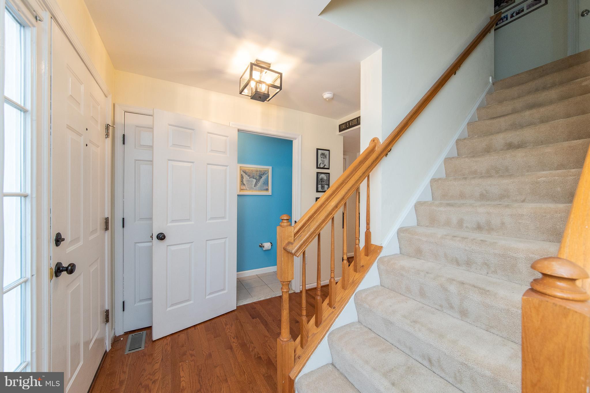 583 Henderson Road Bel Air, MD 21014 - Photo 2 of 42 a view of staircase with railing and a chandelier