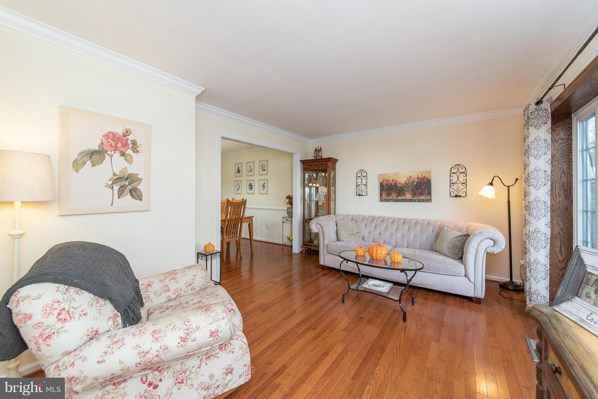 583 Henderson Road Bel Air, MD 21014 - Photo 3 of 42 a living room with furniture and a wooden floor