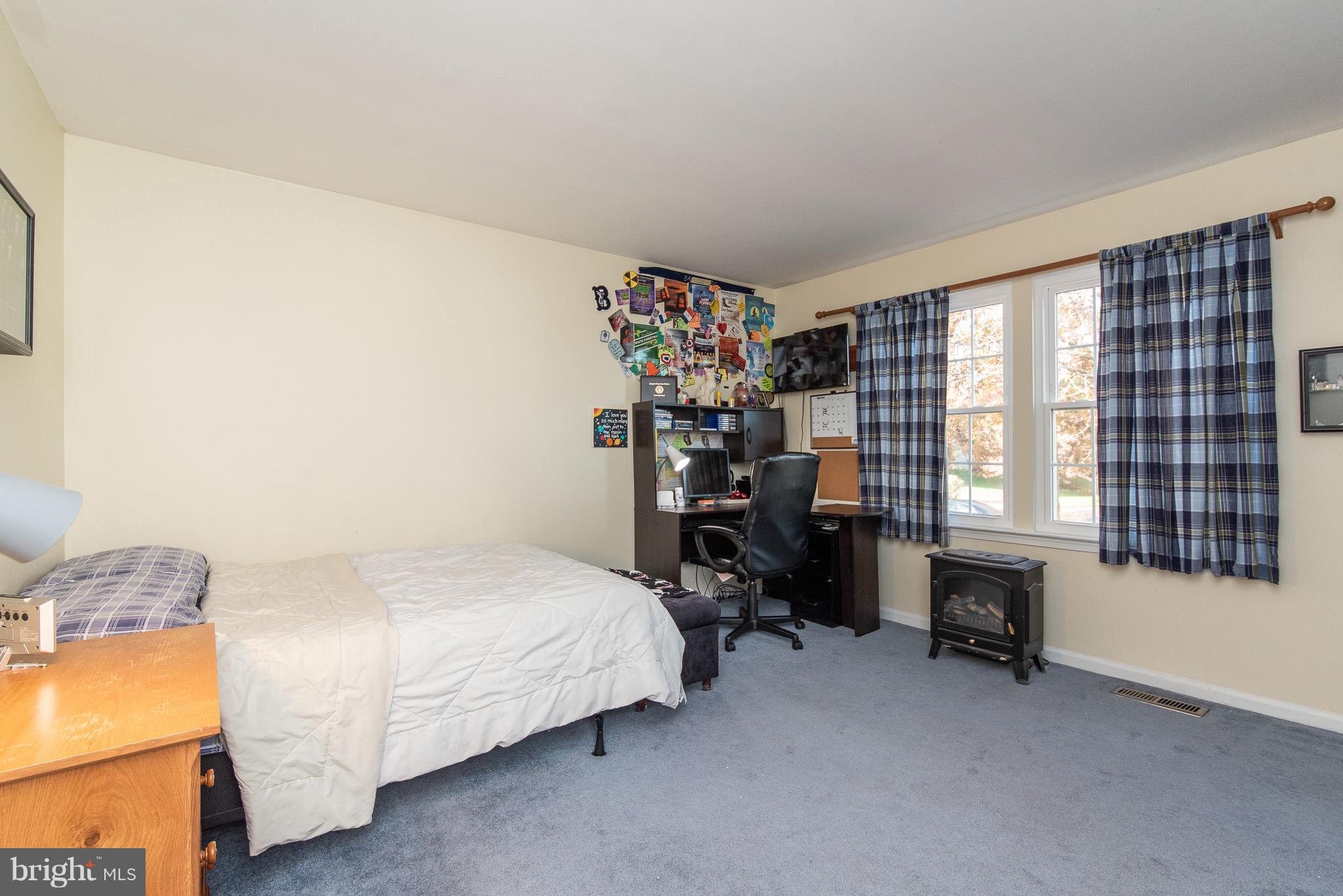 583 Henderson Road Bel Air, MD 21014 - Photo 23 of 42 a bedroom with a bed and a window