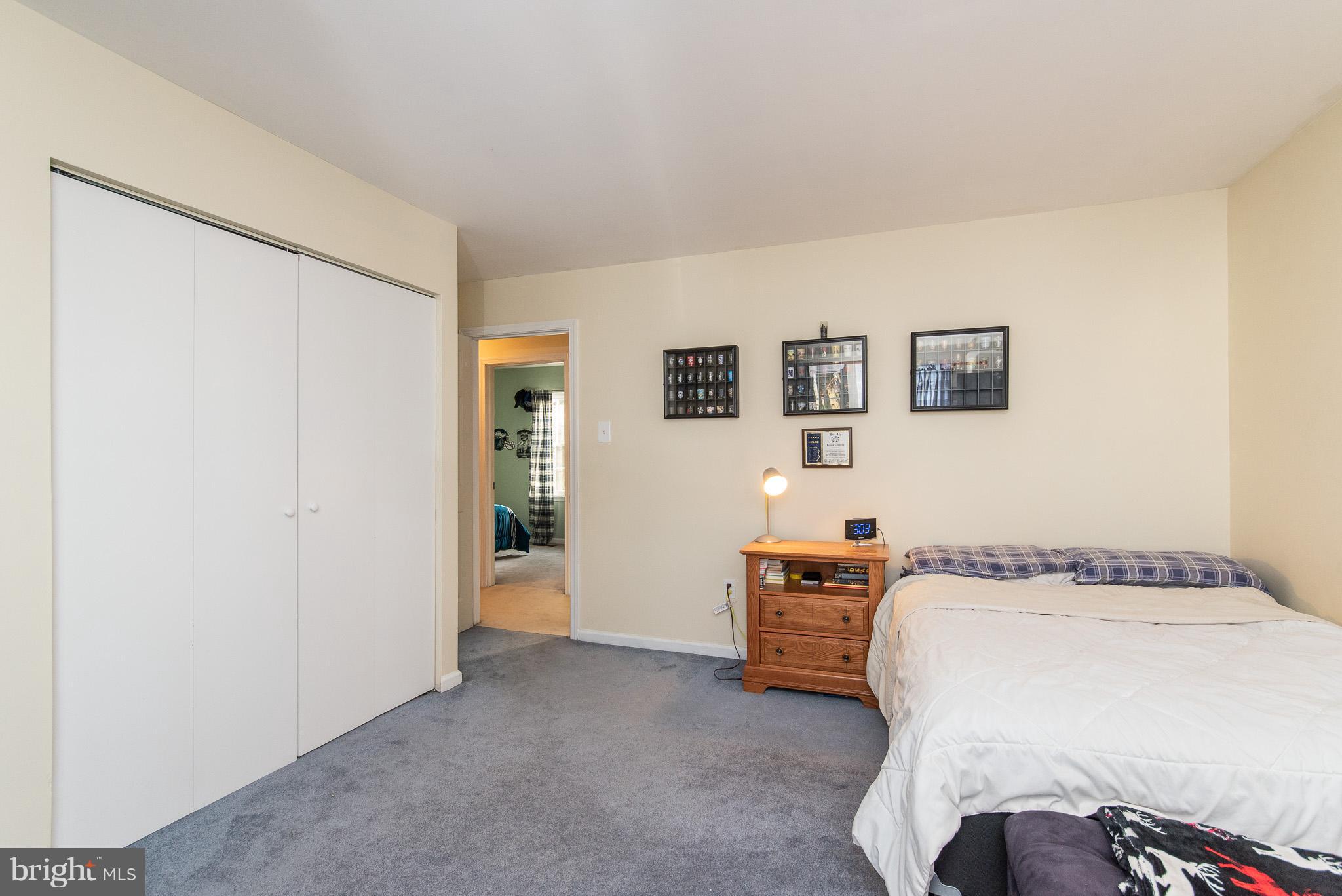 583 Henderson Road Bel Air, MD 21014 - Photo 24 of 42 a bedroom with a bed and a cabinets