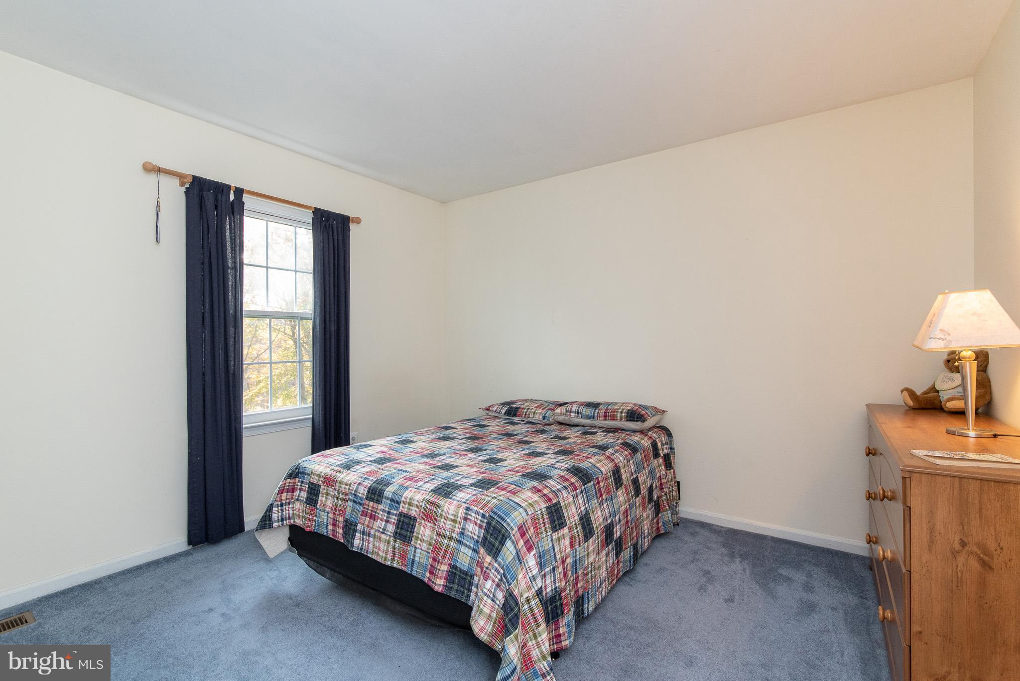583 Henderson Road Bel Air, MD 21014 - Photo 26 of 42 a bedroom with a bed and a window