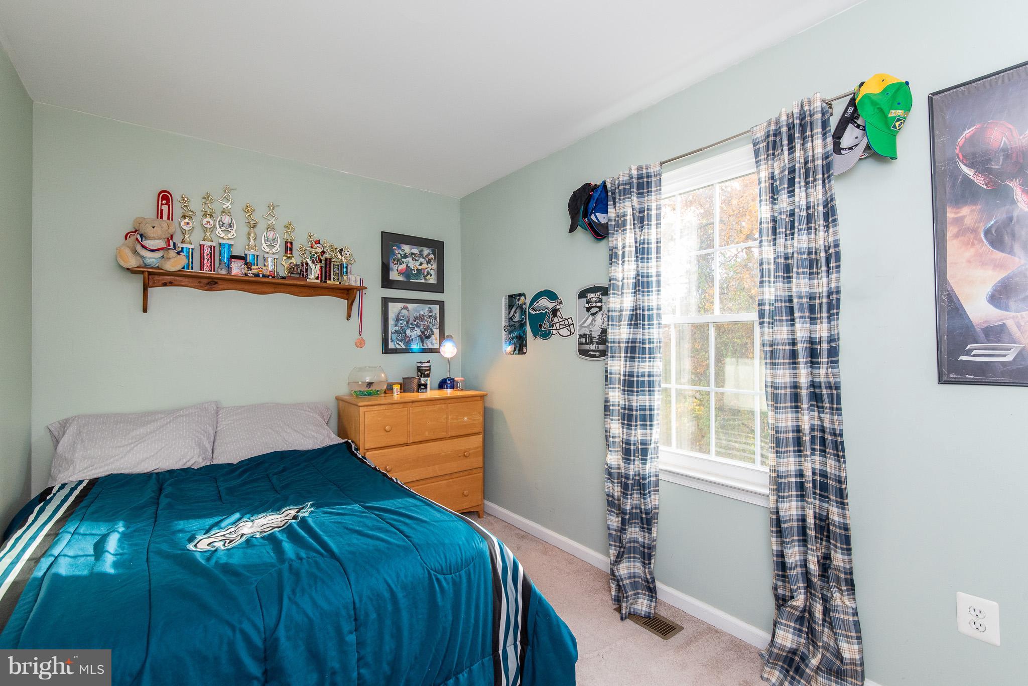 583 Henderson Road Bel Air, MD 21014 - Photo 30 of 42 a bedroom with furniture and a bed