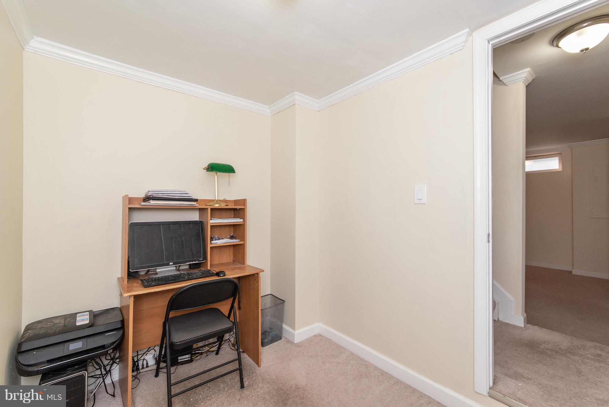 583 Henderson Road Bel Air, MD 21014 - Photo 33 of 42 a view of a workspace with furniture and a window